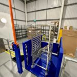 A MCL low rise lift in a warehouse setting.